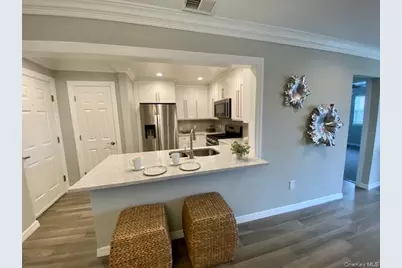 25 Westwood Drive #15, Westbury, NY 11590 - Photo 2