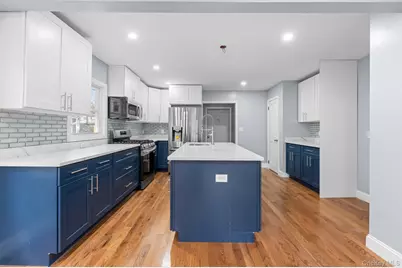 14235 Sutter Avenue, Ozone Park, NY 11436 - Photo 1