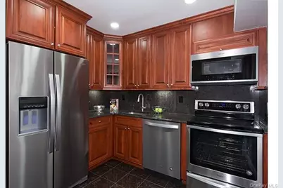 1 Villa D'Est Drive #A-09, Coram, NY 11727 - Photo 2