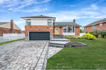 556 N Suffolk Avenue, Massapequa, NY 11758 - Photo 1
