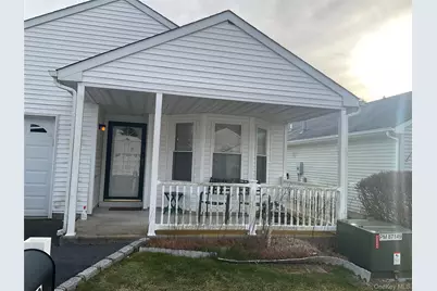 409 Village Circle N, Manorville, NY 11949 - Photo 1