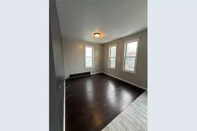 3145 84th Street #2nd Floor, East Elmhurst, NY 11370 - Photo 1