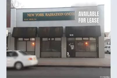 92-02 Liberty Avenue, Ozone Park, NY 11417 - Photo 1