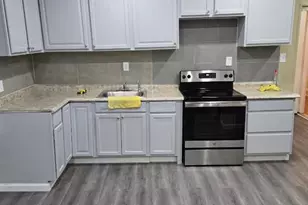 105-12 Liberty Ave, Ozone Park, NY 11417 - Photo 1