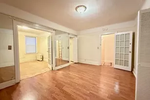 31-22 100th St, East Elmhurst, NY 11369 - Photo 1