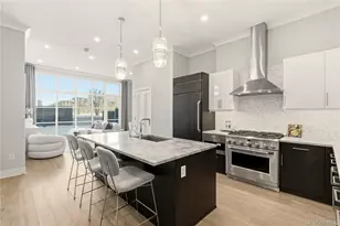 100 Garvies Point Rd, Glen Cove, NY 11542 - Photo 14