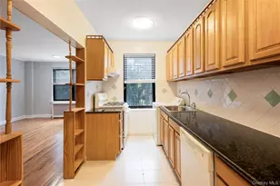 76-12 Ditmars Blvd, East Elmhurst, NY 11370 - Photo 2