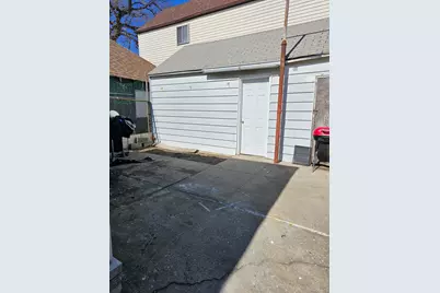 9417 Pitkin Avenue, Ozone Park, NY 11417 - Photo 22