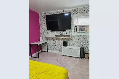 9417 Pitkin Avenue, Ozone Park, NY 11417 - Photo 10