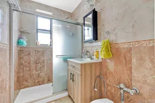 141-05 Pershing Crescent, Briarwood, NY 11435 - Photo 24