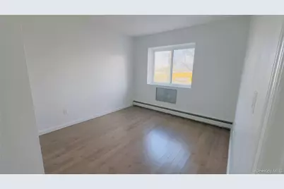 31-22 60th St, Woodside, NY 11377 - Photo 1