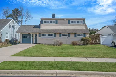 7 Woodpecker Lane, Levittown, NY 11756 - Photo 1