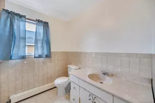 24 Pleasant Ave, Roosevelt, NY 11575 - Photo 16