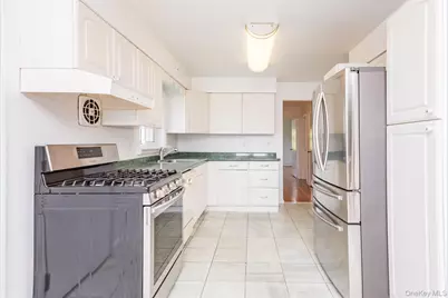 7107 Ditmars Boulevard, East Elmhurst, NY 11370 - Photo 10