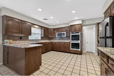 18 Quaker Ridge Drive, Brookville, NY 11545 - Photo 16