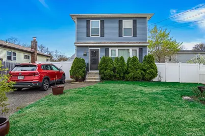 144 Washington Avenue, Wheatley Heights, NY 11798 - Photo 1