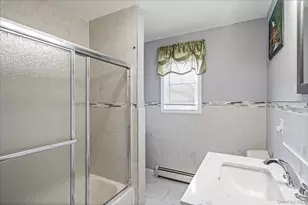 144 Washington Ave, Wheatley Heights, NY 11798 - Photo 16
