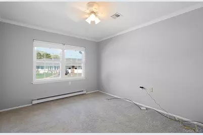 54 Aylesbury Court #B, Ridge, NY 11961 - Photo 10