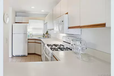 49 Canoe Place Road #416, Hampton Bays, NY 11946 - Photo 18