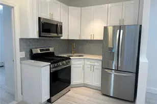 32-53 102nd St, East Elmhurst, NY 11369 - Photo 1