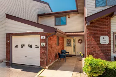 37 Cambridge Drive W #37, Copiague, NY 11726 - Photo 1