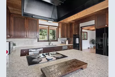 6480 Kilimanjaro Drive, Evergreen, CO 80439 - Photo 18