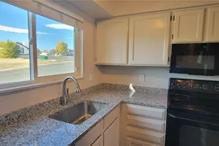 8770 Rainbow Ave, Denver, CO 80229 - Photo 6