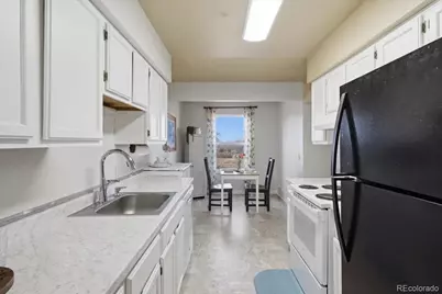 3121 S Tamarac Drive #302H, Denver, CO 80231 - Photo 4