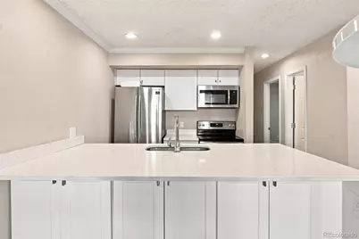 5770 E Warren Avenue #104, Denver, CO 80222 - Photo 2
