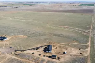 61800 E 32nd Ct, Strasburg, CO 80136 - Photo 1