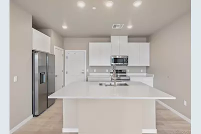 6153 N Ceylon Street #102, Denver, CO 80249 - Photo 4