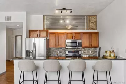 15475 Andrews Drive #204, Denver, CO 80239 - Photo 1