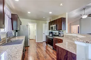 5647 S Quatar Ct, Centennial, CO 80015 - Photo 6