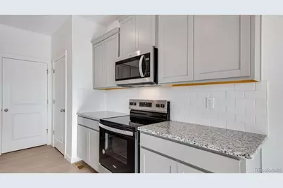 9855 Ceylon Court, Commerce City, CO 80022 - Photo 12