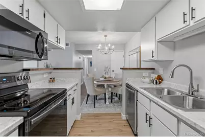 8555 Fairmount Drive #E102, Denver, CO 80247 - Photo 2