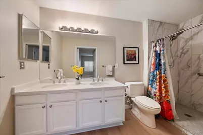 8655 W Berry Avenue #104, Littleton, CO 80123 - Photo 14