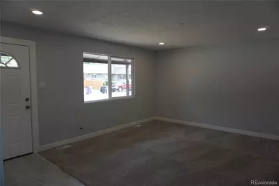 5527 Chandler Court, Denver, CO 80239 - Photo 6