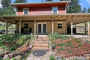 5211 Parmalee Gulch Rd, Indian Hills, CO 80454 - Photo 1