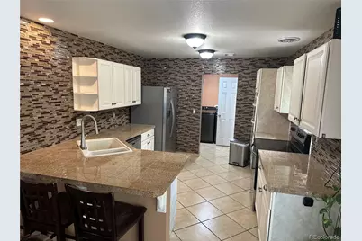 20476 Robins Drive, Denver, CO 80249 - Photo 6