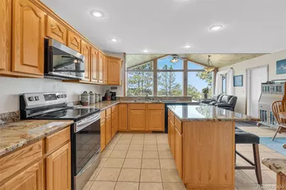 915 N Bluff Drive, Franktown, CO 80116 - Photo 10