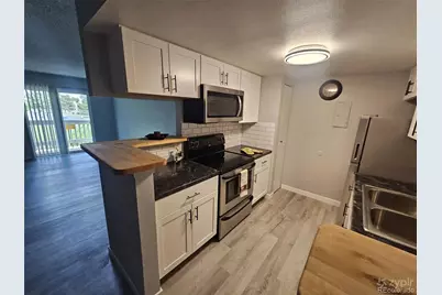 8555 Fairmount Drive #J103, Denver, CO 80247 - Photo 16