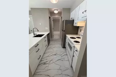 2575 S Syracuse Way #J102, Denver, CO 80231 - Photo 4