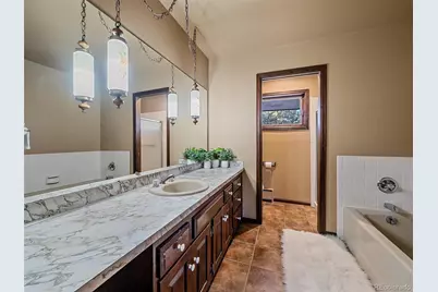 7990 Tim Tam Trail, Evergreen, CO 80439 - Photo 22