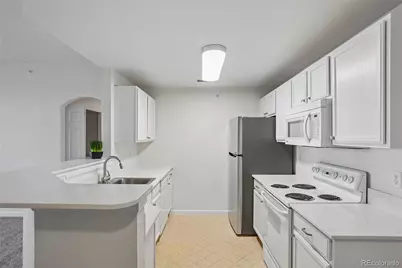 7440 S Blackhawk Street #11-203, Englewood, CO 80112 - Photo 12