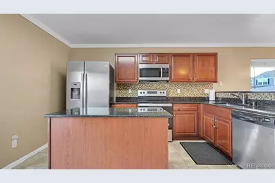 5556 Flanders Way, Denver, CO 80249 - Photo 10