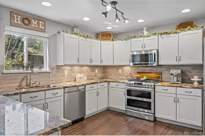 7039 Pine Hills Way, Littleton, CO 80125 - Photo 14