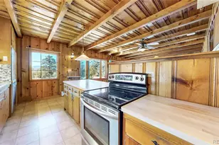 6755 Marshmerry Ln, Evergreen, CO 80439 - Photo 10