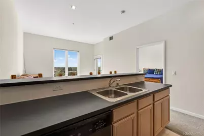 15475 Andrews Drive #406, Denver, CO 80239 - Photo 4