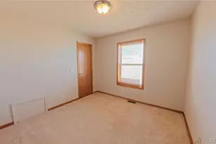 56100 E 33rd Ct, Strasburg, CO 80136 - Photo 14