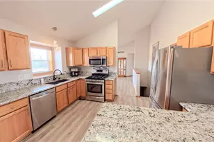 56100 E 33rd Ct, Strasburg, CO 80136 - Photo 4